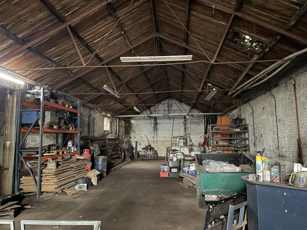 Lot: 48 - VALUABLE WORKSHOPS WITH OFFICES AND YARD AREA CLOSE TO TOWN CENTRE - Internal view of large rear workshop